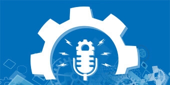 An industrial cog with a podcast microphone sitting inside it